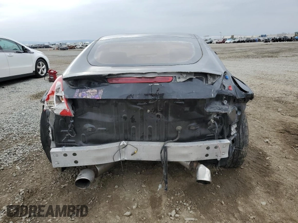 2015 Nissan 370Z with VIN JN1AZ4EH8FM444456, listed as a Copart auction lot 76279024 with 58,513 mi miles and Salvage Title. Bid and sale history available at carsss.com. Image 6.