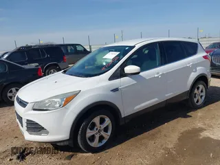 2013 Ford Escape SE with VIN 1FMCU0GX1DUA80455, listed as a IAAI auction lot 41756952 with 211,389 mi miles. Bid and sale history available at carsss.com. Image 2.