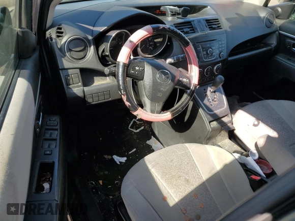 2012 Mazda 5 Sport with VIN JM1CW2BL4C0139163, listed as a Copart auction lot 75521794 with 211,595 mi miles and Salvage Title. Bid and sale history available at DreamBid. Image 8.