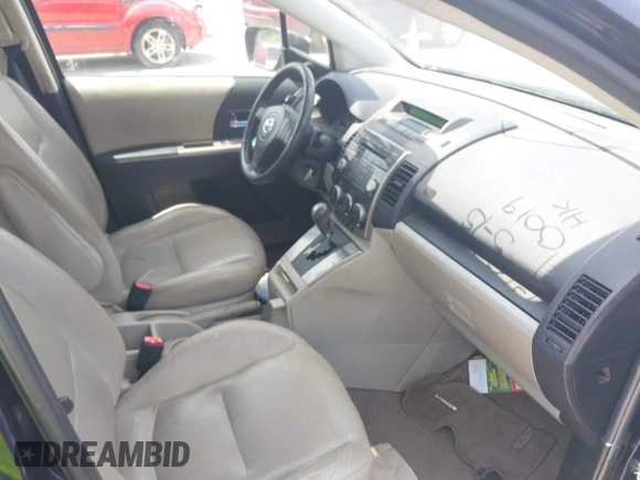 2009 Mazda 5 Touring with VIN JM1CR29L890340411, listed as a IAAI auction lot 42270019 with 150,892 mi miles and . Bid and sale history available at DreamBid. Image 5.