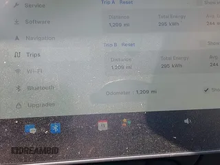 2025 Tesla Model Y Long Range with VIN 7SAYGDED3SA352138, listed as a IAAI auction lot 41760798 with 1,209 mi miles and . Bid and sale history available at DreamBid. Image 7.