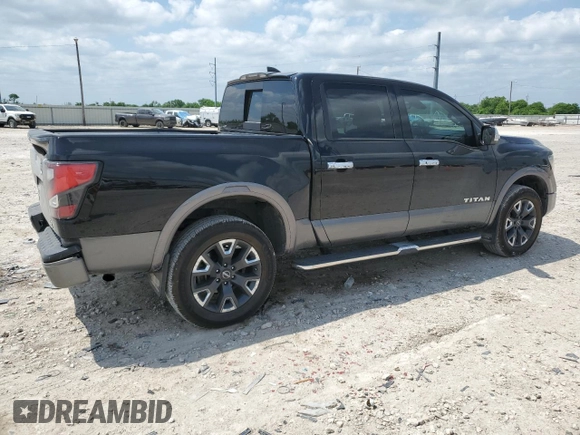 2023 Nissan Titan Platinum Reserve with VIN 1N6AA1EDXPN106467, listed as a Copart auction lot 53455215 with 56,061 mi miles and Salvage title. Bid and sale history available at DreamBid. Image 3.