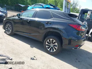 2021 Lexus RX 350 with VIN 2T2HZMDA1MC260014, listed as a IAAI auction lot 42158850 with 32,453 mi miles and . Bid and sale history available at DreamBid. Image 3.