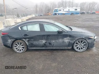 2022 Mazda 3 Premium with VIN 3MZBPADL7NM316513, listed as a IAAI auction lot 41347291 with 47,351 mi miles and . Bid and sale history available at DreamBid. Image 13.