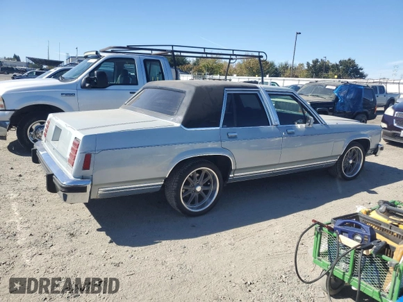 1987 Ford Crown Victoria z VIN 2FABP74F5HX169963, wystawiony jako Copart lot #75491944 z przebiegiem 89 729 mil mil oraz Szkody całkowita. Historia ofert i sprzedaży dostępna na DreamBid. Obrazek 3.
