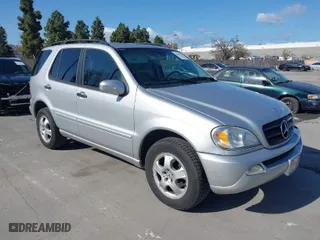 2005 Mercedes-Benz M-Class 3.7L with VIN 4JGAB57E65A525820, listed as a IAAI auction lot 41943683 with 147,860 mi miles. Bid and sale history available at carsss.com. Image 1.