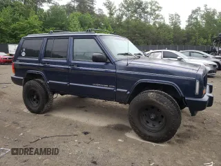 1997 Jeep Cherokee Country with VIN 1J4FJ78S4VL589852, listed as a Copart auction lot 56294015 with 189,530 mi miles and Salvage title. Bid and sale history available at DreamBid. Image 4.