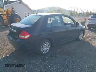 2010 Nissan Versa S with VIN 3N1BC1AP9AL361302, listed as a IAAI auction lot 42102135 with 127,849 mi miles and . Bid and sale history available at DreamBid. Image 4.