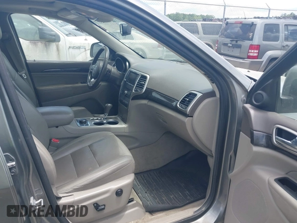2011 Jeep Grand Cherokee Laredo with VIN 1J4RR4GG3BC595896, listed as a IAAI auction lot 42632333 with 135,426 mi miles and . Bid and sale history available at DreamBid. Image 5.