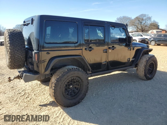 2014 Jeep Wrangler Unlimited Rubicon X with VIN 1C4HJWFG8EL119654, listed as a Copart auction lot 46699055 with 148,412 mi miles and Salvage title. Bid and sale history available at DreamBid. Image 3.
