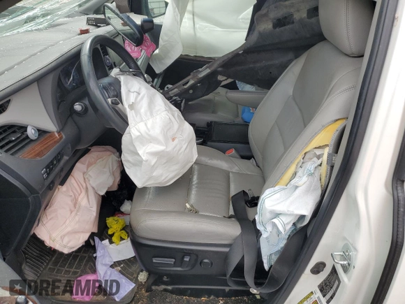 2015 Toyota Sienna XLE with VIN 5TDYK3DC7FS585748, listed as a Copart auction lot 55459495 with Not provided miles and Salvage title. Bid and sale history available at DreamBid. Image 7.