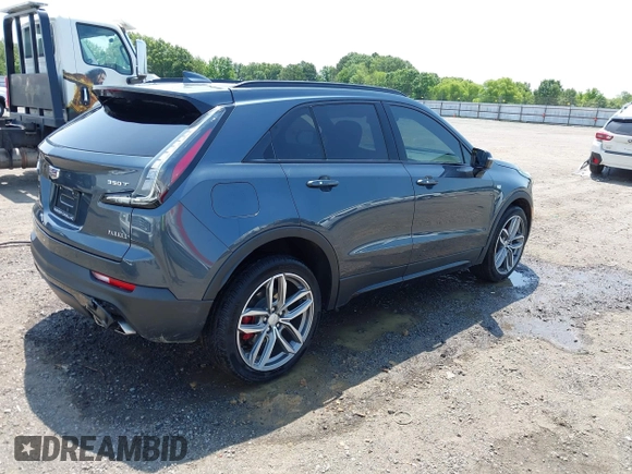 2021 Cadillac XT4 FWD Sport with VIN 1GYFZER41MF079193, listed as a IAAI auction lot 42331594 with 72,287 mi miles and . Bid and sale history available at DreamBid. Image 4.