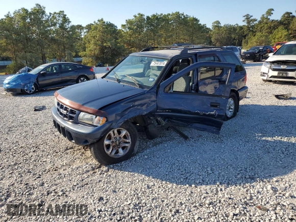 2002 Isuzu Rodeo S with VIN 4S2CK58W124307433, listed as a Copart auction lot 75447074 with 129,163 mi miles and Salvage title. Bid and sale history available at DreamBid. Image 1.