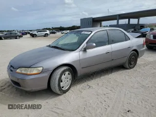 2000 Honda Accord LX z VIN 1HGCG1648YA027480, wystawiony jako Copart lot #45321345 z przebiegiem 265 632 mil mil oraz Szkoda całkowita • Salvage title. Historia ofert i sprzedaży dostępna na DreamBid. Obrazek 1.
