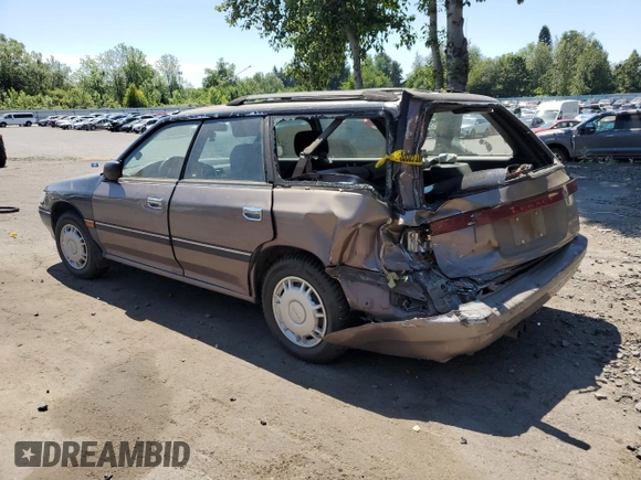 1993 Subaru Legacy L with VIN 4S3BJ6339P6948161, listed as a Copart auction lot 63123584 with 329,619 mi miles and Salvage Title. Bid and sale history available at DreamBid. Image 2.