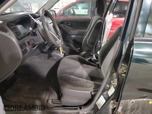 2002 Chevrolet Tracker LT z VIN 2CNBJ634126949974, wystawiony jako Copart lot #54819695 z przebiegiem 200 895 mil mil oraz Szkoda całkowita • Salvage title. Historia ofert i sprzedaży dostępna na DreamBid. Obrazek 7.