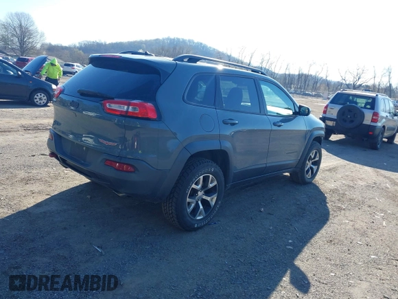 2014 Jeep Cherokee Trailhawk with VIN 1C4PJMBS4EW179763, listed as a IAAI auction lot 41988048 with 152,681 mi miles. Bid and sale history available at carsss.com. Image 4.