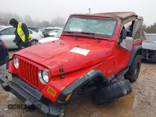 2000 Jeep Wrangler SE with VIN 1J4FA29P7YP793068, listed as a IAAI auction lot 41576287 with 113,298 mi miles. Bid and sale history available at carsss.com. Image 2.