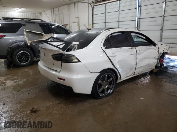 2015 Mitsubishi Lancer Evolution Final Edition z VIN JA32W7FV4FU028743, wystawiony jako Copart lot #75206334 z przebiegiem 51 409 mil mil oraz Szkody całkowita. Historia ofert i sprzedaży dostępna na DreamBid. Obrazek 3.
