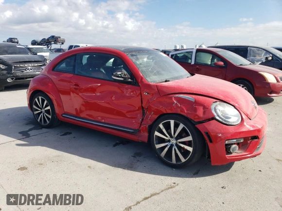 2014 Volkswagen Beetle Turbo R-Line with VIN 3VWVT7AT0EM656599, listed as a Copart auction lot 86358334 with 66,050 mi miles and Salvage Title. Bid and sale history available at DreamBid. Image 4.