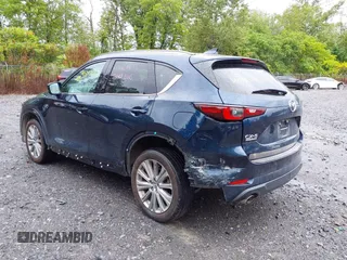 2023 Mazda CX-5 Signature with VIN JM3KFBXY4P0153335, listed as a IAAI auction lot 40053867 with 17,828 mi miles and . Bid and sale history available at carsss.com. Image 3.
