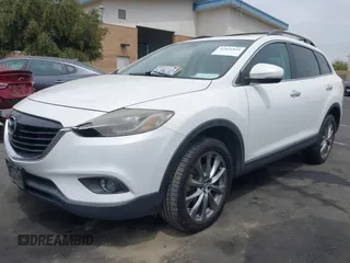 2015 Mazda CX-9 Grand Touring z VIN JM3TB2DV9F0458340, wystawiony jako IAAI lot #42021843 z przebiegiem 145 929 mil mil oraz . Historia ofert i sprzedaży dostępna na DreamBid. Obrazek 19.