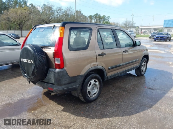 2003 Honda CR-V LX with VIN JHLRD68513C009276, listed as a IAAI auction lot 41563452 with 240,519 mi miles and . Bid and sale history available at DreamBid. Image 4.