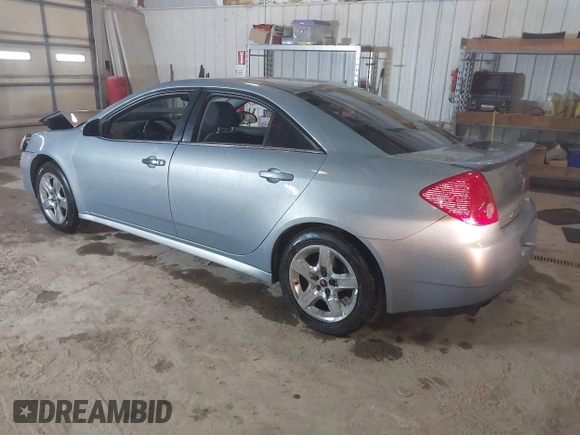 2009 Pontiac G6 1SB with VIN 1G2ZJ57B894237824, listed as a IAAI auction lot 41731113 with 144,914 mi miles and . Bid and sale history available at DreamBid. Image 3.