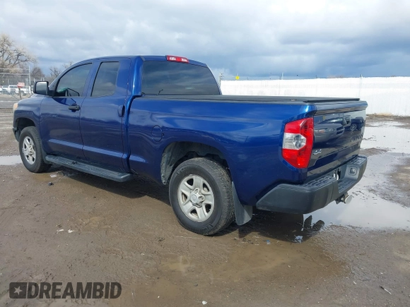 2014 Toyota Tundra SR with VIN 5TFUM5F17EX056082, listed as a IAAI auction lot 41884095 with 155,036 mi miles and . Bid and sale history available at DreamBid. Image 3.