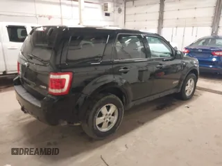 2008 Ford Escape XLT with VIN 1FMCU93108KA04863, listed as a IAAI auction lot 42131438 with 126,439 mi miles. Bid and sale history available at carsss.com. Image 4.