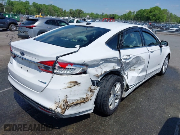 2018 Ford Fusion S z VIN 3FA6P0UU1JR204607, wystawiony jako IAAI lot #41985269 z przebiegiem 116 517 mil mil oraz . Historia ofert i sprzedaży dostępna na DreamBid. Obrazek 4.