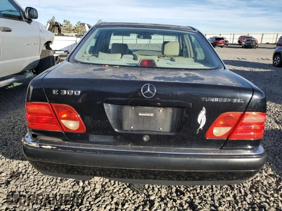1998 Mercedes-Benz E 320 with VIN WDBJF25F4WA504385, listed as a Copart auction lot 79555844 with 392,558 mi miles and Clean Title. Bid and sale history available at DreamBid. Image 6.