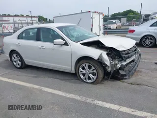2012 Ford Fusion SE z VIN 3FAHP0HG7CR368279, wystawiony jako IAAI lot #42288523 z przebiegiem 176 808 mil mil oraz . Historia ofert i sprzedaży dostępna na DreamBid. Obrazek 1.