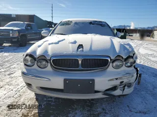 2005 Jaguar X-Type z VIN SAJWB52D95XE21462, wystawiony jako Copart lot #89216475 z przebiegiem 114 257 mil mil oraz Szkoda całkowita • Salvage title. Historia ofert i sprzedaży dostępna na DreamBid. Obrazek 5.