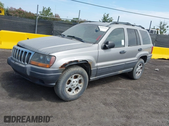 2001 Jeep Grand Cherokee Laredo with VIN 1J4GW48S11C503427, listed as a IAAI auction lot 40004360 with 232,712 mi miles and . Bid and sale history available at DreamBid. Image 2.