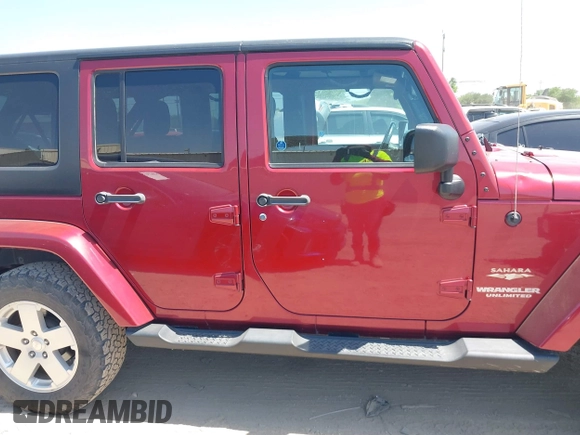 2012 Jeep Wrangler Unlimited Sahara with VIN 1C4BJWEG2CL209600, listed as a IAAI auction lot 42015290 with 133,229 mi miles and . Bid and sale history available at DreamBid. Image 13.