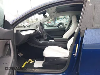 2022 Tesla Model Y Long Range with VIN 7SAYGDEE7NF409294, listed as a IAAI auction lot 41845261 with 73,116 mi miles and . Bid and sale history available at DreamBid. Image 5.