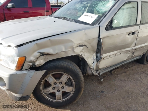 2007 Jeep Grand Cherokee Laredo with VIN 1J8GS48K77C515424, listed as a IAAI auction lot 41072236 with 263,248 mi miles. Bid and sale history available at carsss.com. Image 6.