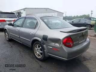 2001 Nissan Maxima SE z VIN JN1CA31D61T830594, wystawiony jako IAAI lot #42283716 z przebiegiem 218 155 mil mil oraz . Historia ofert i sprzedaży dostępna na DreamBid. Obrazek 3.