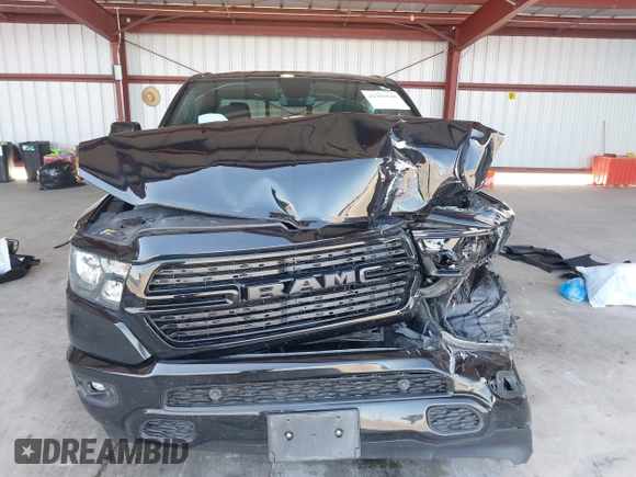 2021 Ram 1500 Big Horn with VIN 1C6SRFBT2MN562927, listed as a IAAI auction lot 42386848 with 83,858 mi miles and . Bid and sale history available at DreamBid. Image 12.