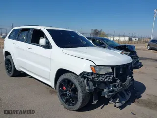 2015 Jeep Grand Cherokee SRT with VIN 1C4RJFDJ4FC122071, listed as a IAAI auction lot 41455849 with 251,476 mi miles. Bid and sale history available at carsss.com. Image 1.