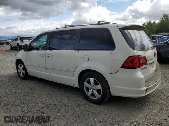 2011 Volkswagen Routan SE with VIN 2V4RW3DG0BR789523, listed as a Copart auction lot 61761785 with 124,530 mi miles and Clean title. Bid and sale history available at DreamBid. Image 2.