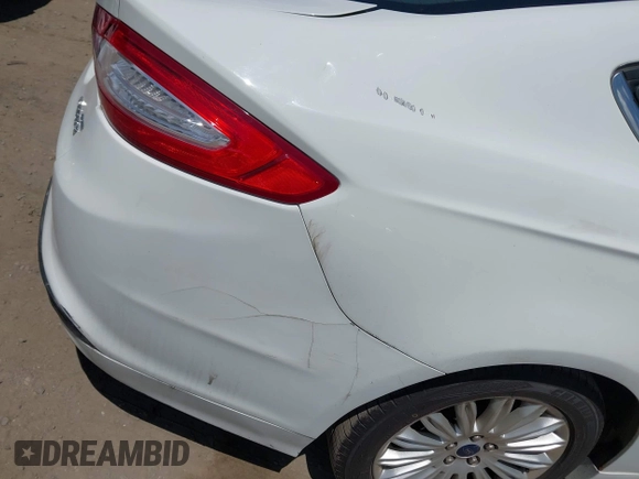 2013 Ford Fusion SE Hybrid with VIN 3FA6P0LU3DR328786, listed as a IAAI auction lot 42604212 with 132,423 mi miles and . Bid and sale history available at DreamBid. Image 6.