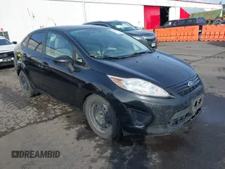 2013 Ford Fiesta S z VIN 3FADP4AJ7DM178265, wystawiony jako IAAI lot #41610346 z przebiegiem 115 963 mil mil oraz . Historia ofert i sprzedaży dostępna na DreamBid. Obrazek 1.