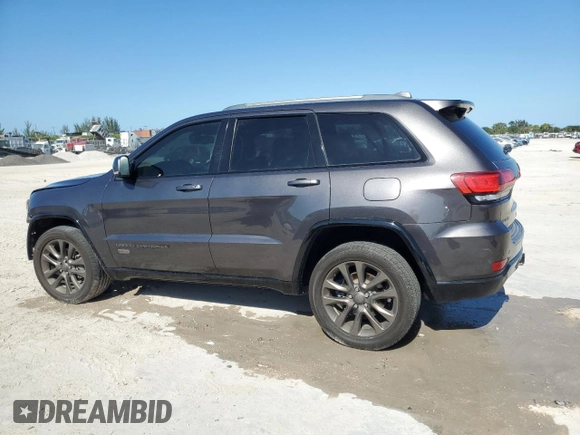 2016 Jeep Grand Cherokee Limited 75th Anniversary with VIN 1C4RJFBG7GC411146, listed as a Copart auction lot 53328675 with 110,439 mi miles and Salvage Title. Bid and sale history available at DreamBid. Image 2.