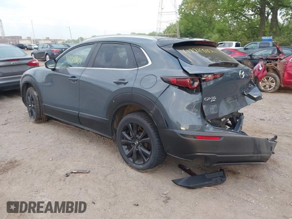 2023 Mazda CX-30 S Carbon Edition with VIN 3MVDMBCM4PM577619, listed as a IAAI auction lot 42219801 with 24,784 mi miles and . Bid and sale history available at DreamBid. Image 3.