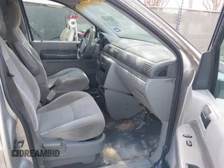2005 Ford Freestar SE z VIN 2FMZA51685BA03136, wystawiony jako IAAI lot #41677029 z przebiegiem 220 511 mil mil oraz . Historia ofert i sprzedaży dostępna na DreamBid. Obrazek 5.