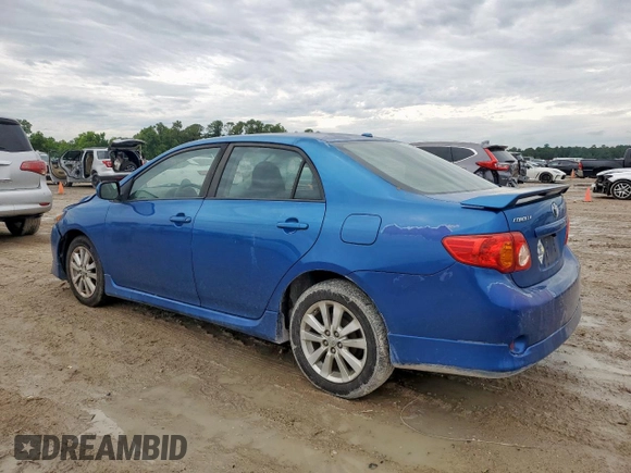 2010 Toyota Corolla with VIN 2T1BU4EE5AC498504, listed as a Copart auction lot 57043515 with 128,651 mi miles and Salvage title. Bid and sale history available at DreamBid. Image 2.