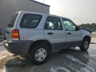 2002 Ford Escape XLS Choice z VIN 1FMYU01102KB13125, wystawiony jako Copart lot #59034495 z przebiegiem 202 253 mil mil oraz Szkoda całkowita • Salvage title. Historia ofert i sprzedaży dostępna na DreamBid. Obrazek 3.