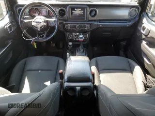 2022 Jeep Wrangler Unlimited Sport S with VIN 1C4HJXDG8NW130208, listed as a Copart auction lot 52572095 with 111,128 mi miles and Salvage Title. Bid and sale history available at DreamBid. Image 8.